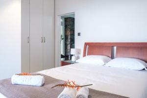 Postel nebo postele na pokoji v ubytování GuestReady - Delight Getaway in Madeira