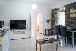 TV a/nebo společenská místnost v ubytování GuestReady - Delight Getaway in Madeira
