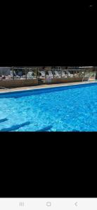 a large swimming pool with blue water in it at 18 Sea Valley Bideford Bay Park Dean in Bideford