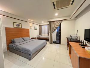 Ένα ή περισσότερα κρεβάτια σε δωμάτιο στο Water Chalet PD Private Unit