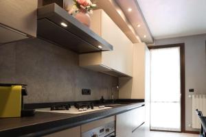 Kuchyň nebo kuchyňský kout v ubytování 15 min Padova Appartamento Moderno Travato