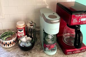 a mixer sitting on a counter next to a coffee maker at Hot Tub Time Capsule with Waterbed & Jukebox in Middle Grove
