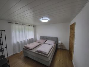 Katil atau katil-katil dalam bilik di 2 Zimmer Appartment in Crailsheim