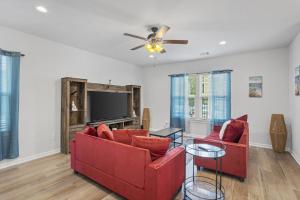 Μια τηλεόραση ή/και κέντρο ψυχαγωγίας στο Tiger Tracks Townhome Stay in Baton Rouge - BC1009