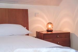 Postel nebo postele na pokoji v ubytování GuestReady - Delight Getaway in Madeira