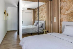 En eller flere senge i et værelse på Villa Écrin Du Lac + 35 billeder