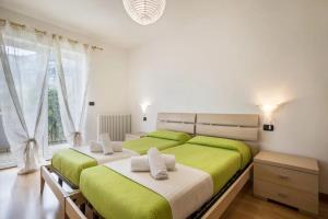 Postel nebo postele na pokoji v ubytování Agritur Laura