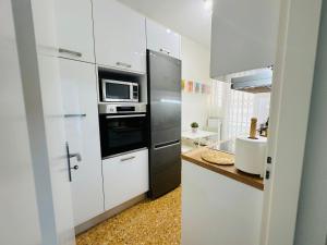 Kuchyň nebo kuchyňský kout v ubytování Natassa's Apartment