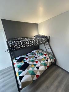 En eller flere senge i et værelse på Appt 3Pièces centre ville Biscarrosse