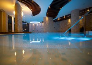 Bazén v ubytování Hotel Camino Real nebo v jeho okolí