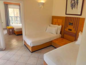 Postel nebo postele na pokoji v ubytování Appart-Hotel EZZAHIA by HMS