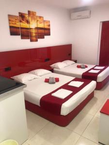 A bed or beds in a room at Royal Palace Még 37 kép