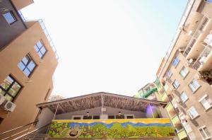 a view of a building with a mural on it at Swan7 Studios in Plovdiv
