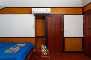 Le Dugong Libong Resort客房内的一张或多张床位