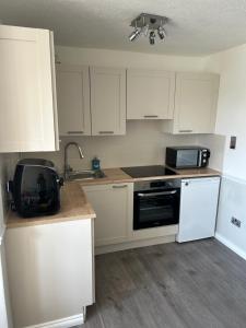 Køkken eller tekøkken på Costal retreat - chalet 275 + 10 billeder