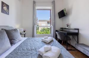 Postel nebo postele na pokoji v ubytování Hesa House