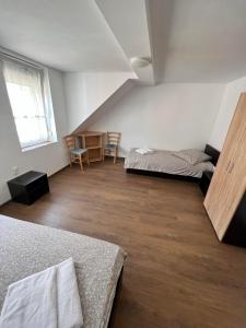 Postel nebo postele na pokoji v ubytování Gästehaus EMELI
