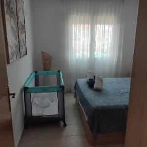 Postel nebo postele na pokoji v ubytování Résidence Maëlla