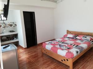 Postel nebo postele na pokoji v ubytování Centro Vacacional Los Pijaos + 52 fotografií