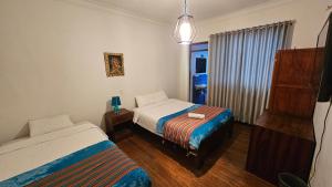 Postel nebo postele na pokoji v ubytování Natural B&B Guest House