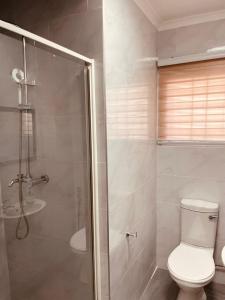 Koupelna v ubytování en-suite private room