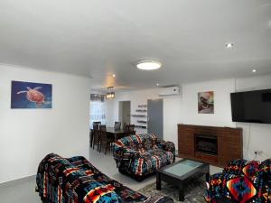 TV a/nebo společenská místnost v ubytování en-suite private room