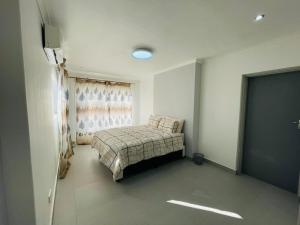 Postel nebo postele na pokoji v ubytování en-suite private room