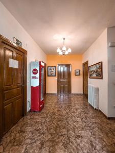 an empty hallway with a coke machine in a room at Hernani Bardenas in Arguedas