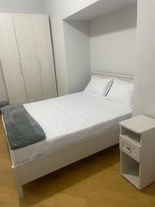 Voodi või voodid majutusasutuse Olympic Hostel toas