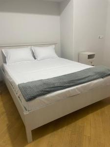 Voodi või voodid majutusasutuse Olympic Hostel toas