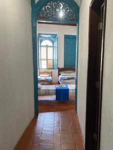 Postel nebo postele na pokoji v ubytování Pousada e Camping Lumiar