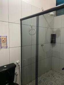 Koupelna v ubytování Pousada e Camping Lumiar