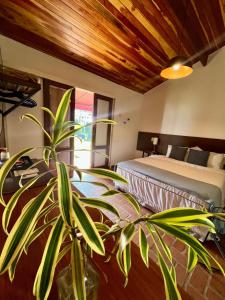 Postel nebo postele na pokoji v ubytování Hotel Casa Paradiso Guarujá