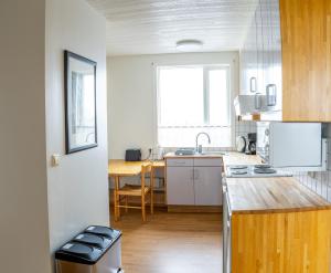 Kuchyň nebo kuchyňský kout v ubytování The Nest