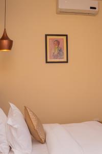 Ένα ή περισσότερα κρεβάτια σε δωμάτιο στο Temple Himalaya Hotel & Spa