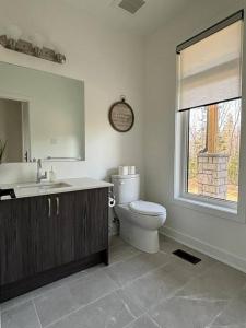 A bathroom at Whispering Pines Muskoka 3BR 3 Ensuite Baths