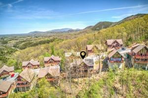 an aerial view of a home with mountains in the background at Pitch Perfect in Sevierville