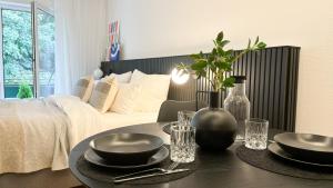 Postel nebo postele na pokoji v ubytování Inside Willingen - Design Apartment mit Balkon