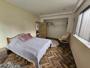 Postel nebo postele na pokoji v ubytování Elva Majutus - Puhkemaja - Hot Tub l Sauna l BBQ