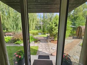Zahrada ubytování Elva Majutus - Puhkemaja - Hot Tub l Sauna l BBQ