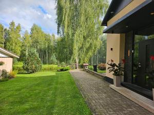 Zahrada ubytování Elva Majutus - Puhkemaja - Hot Tub l Sauna l BBQ