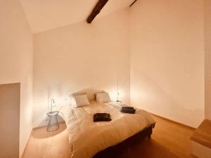Postel nebo postele na pokoji v ubytování Gîte chez Naisse