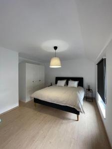Postel nebo postele na pokoji v ubytování Gîte chez Naisse