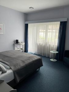 Voodi või voodid majutusasutuse Hotel Markgraf toas