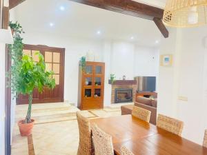 a living room with a table and a couch at La Almadraba in Chiclana de la Frontera