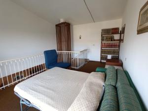 Ένα ή περισσότερα κρεβάτια σε δωμάτιο στο La Casa Del Nonno