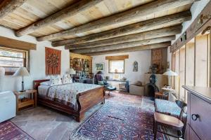Postel nebo postele na pokoji v ubytování Casa de las Piedras
