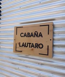a sign that says calandra la latrarro on a wall at Casa en Barrio Privado cerca de la playa in Las Grutas