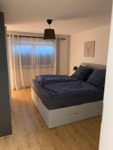 Postel nebo postele na pokoji v ubytování Ferienwohnung Rickelhoff + 12 fotografií