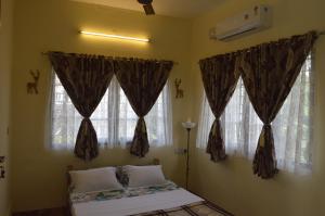 Postel nebo postele na pokoji v ubytování Aldos Ark Home Stay